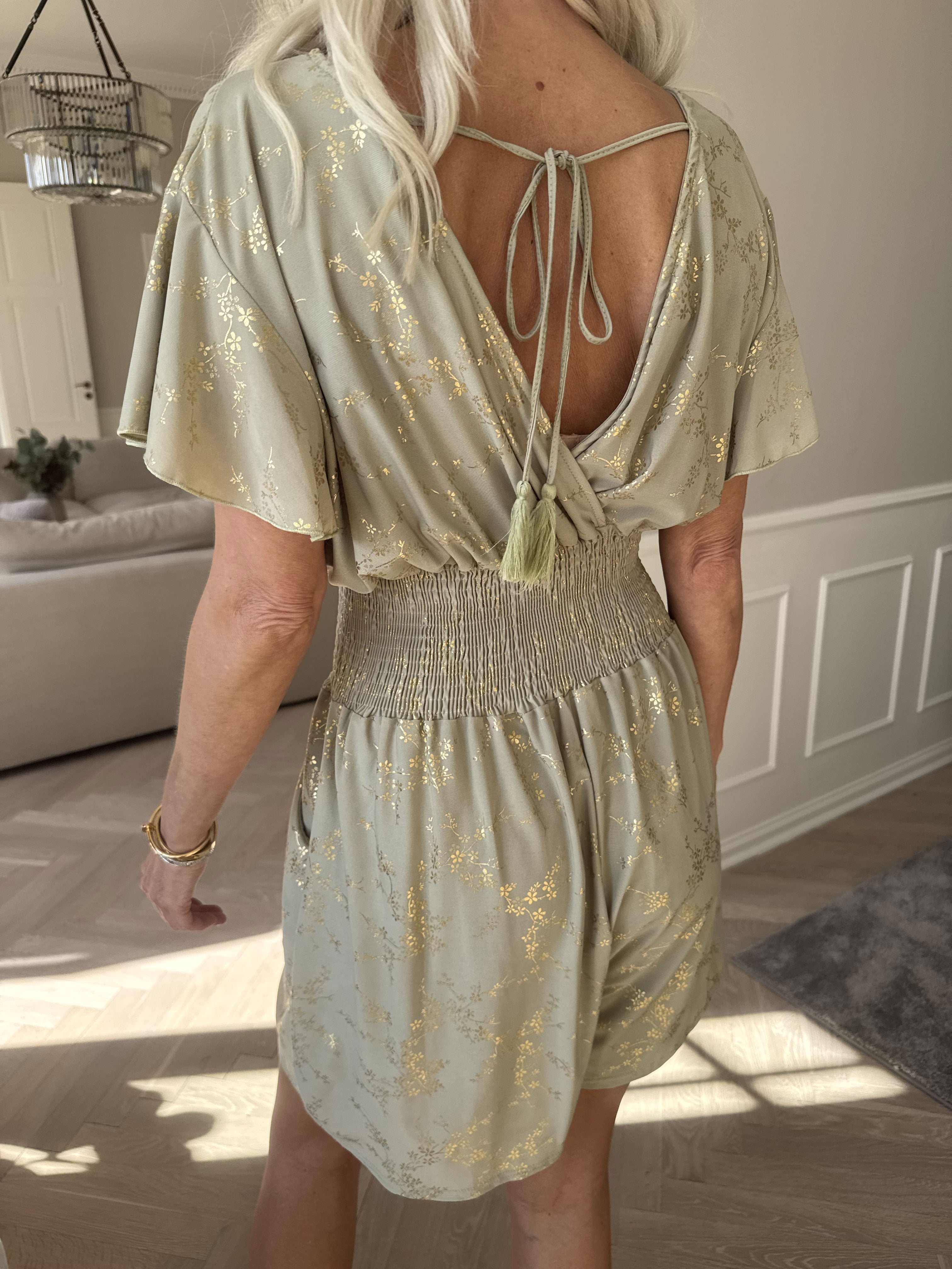 Pams Gold Playsuit - Jumpsuit med resår och guldtryck
